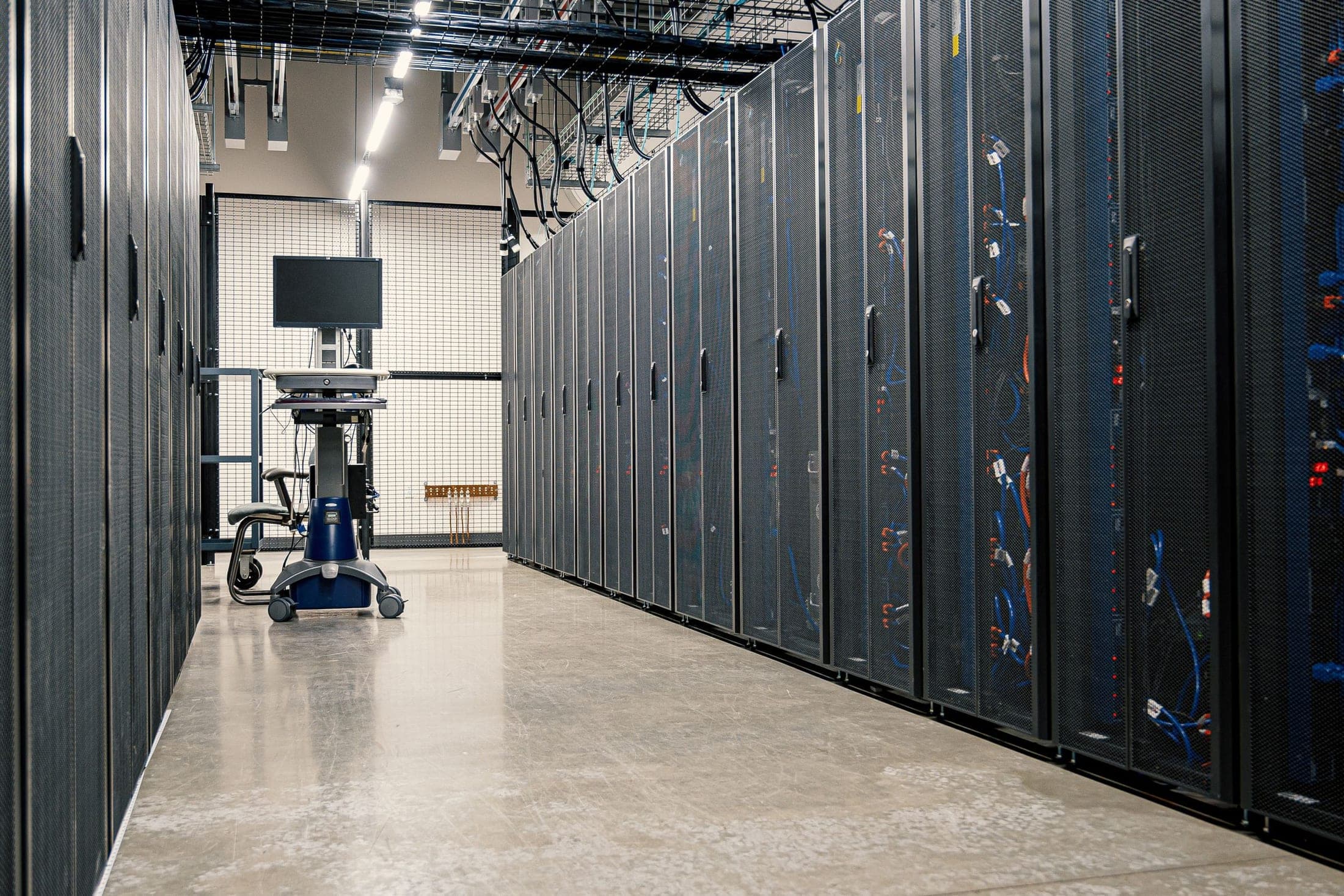Rows of server racks in a secure data centre
